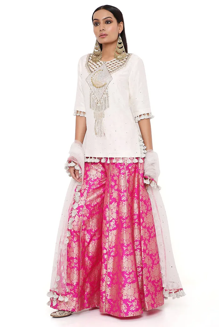 AMAYA OFF WHITE ABLA SILK EMBROIDERED KURTA WITH HOT PINK BROCADE SHARARA AND OFF WHITE DUPATTA