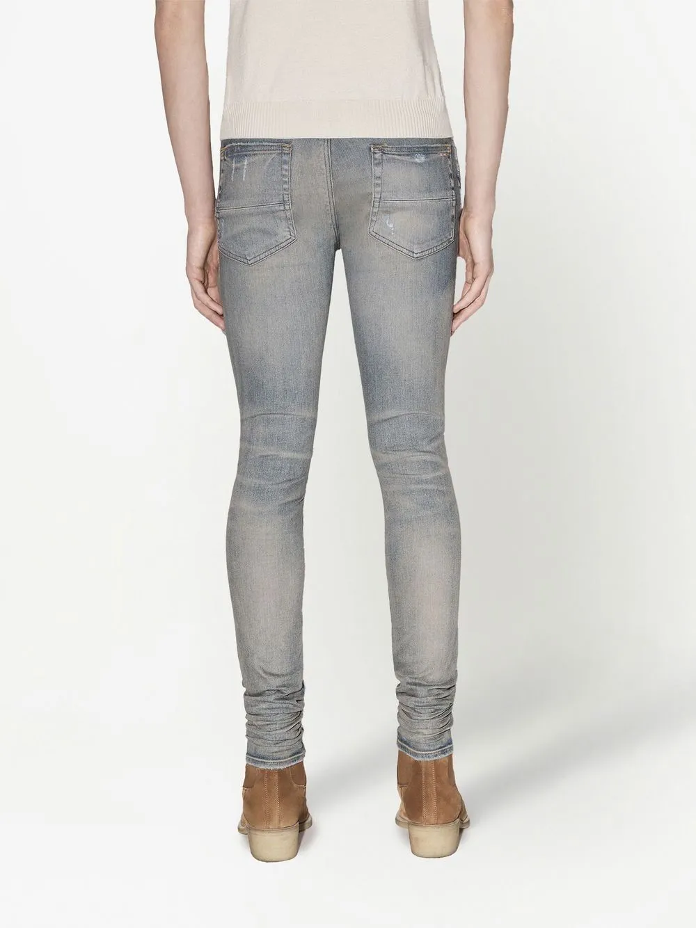 AMIRI Ultra Suede low-rise skinny jeans
