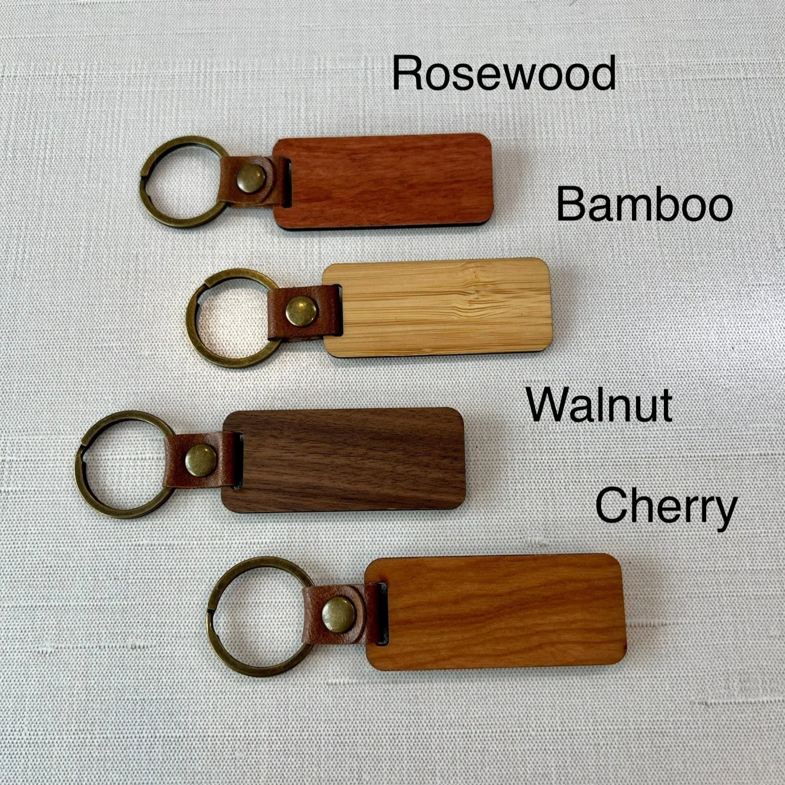 Custom Engraved Walnut, Cherry, Bamboo, and Rosewood Keychains