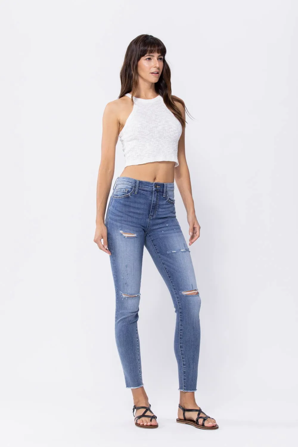 Distressed Mid Rise Skinny Jeans