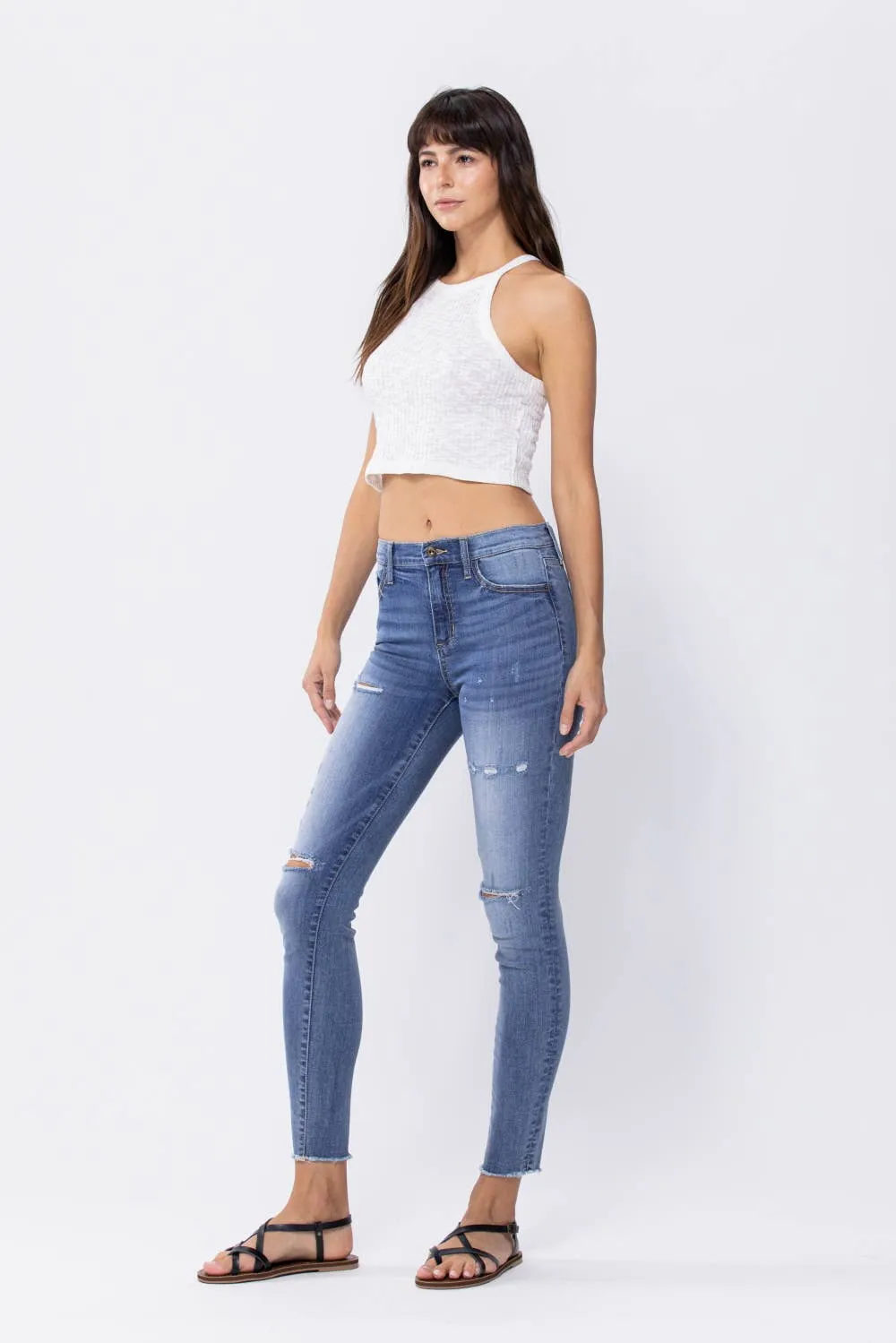 Distressed Mid Rise Skinny Jeans