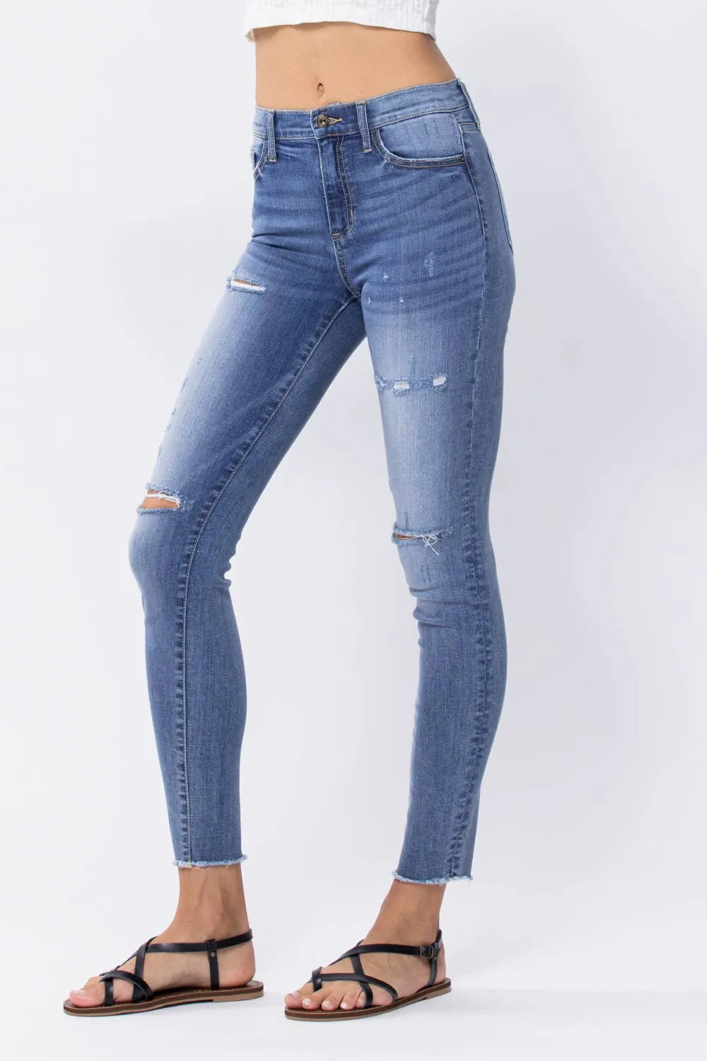 Distressed Mid Rise Skinny Jeans