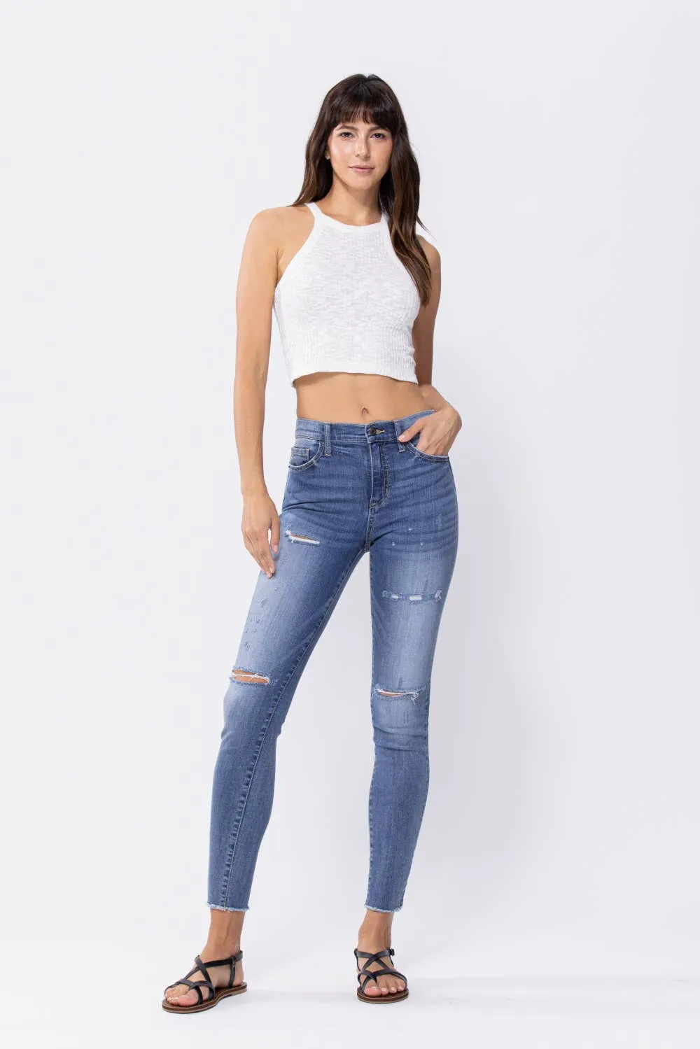 Distressed Mid Rise Skinny Jeans