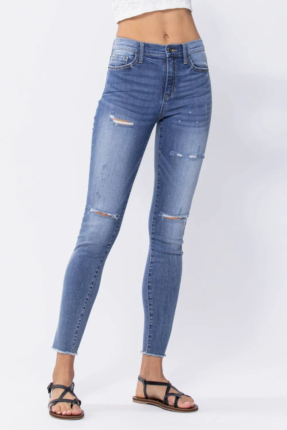 Distressed Mid Rise Skinny Jeans