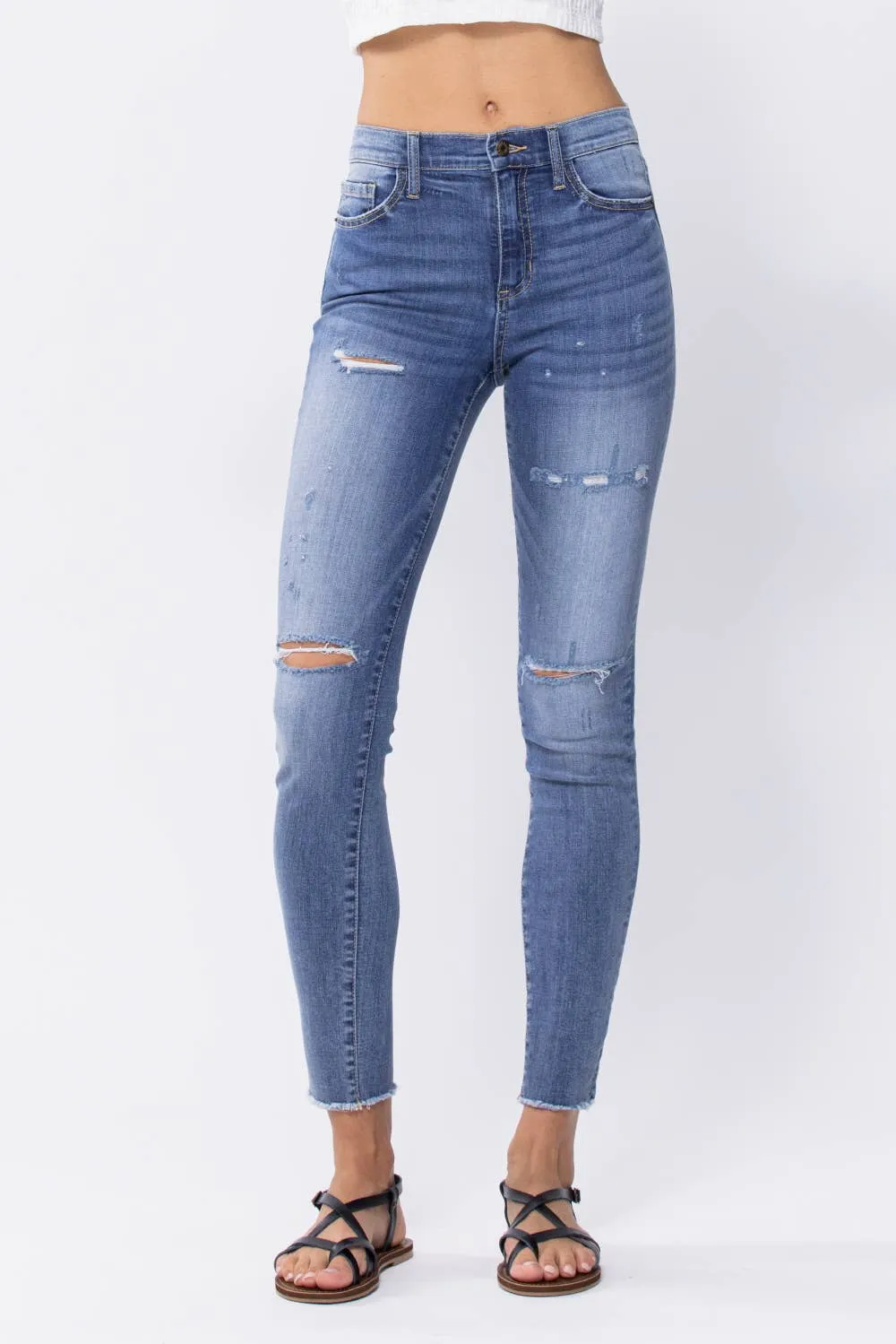 Distressed Mid Rise Skinny Jeans