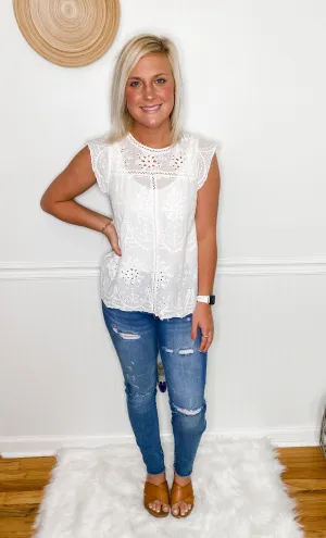 Distressed Mid Rise Skinny Jeans