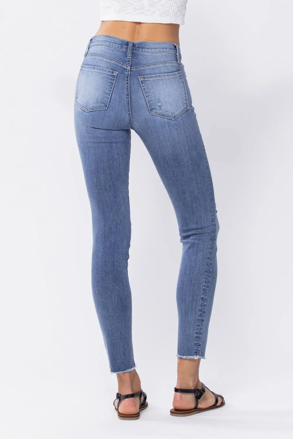Distressed Mid Rise Skinny Jeans