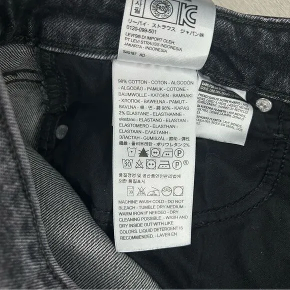 Levi’s 711 Skinny dark gray distressed raw hem jeans women’s size 27
