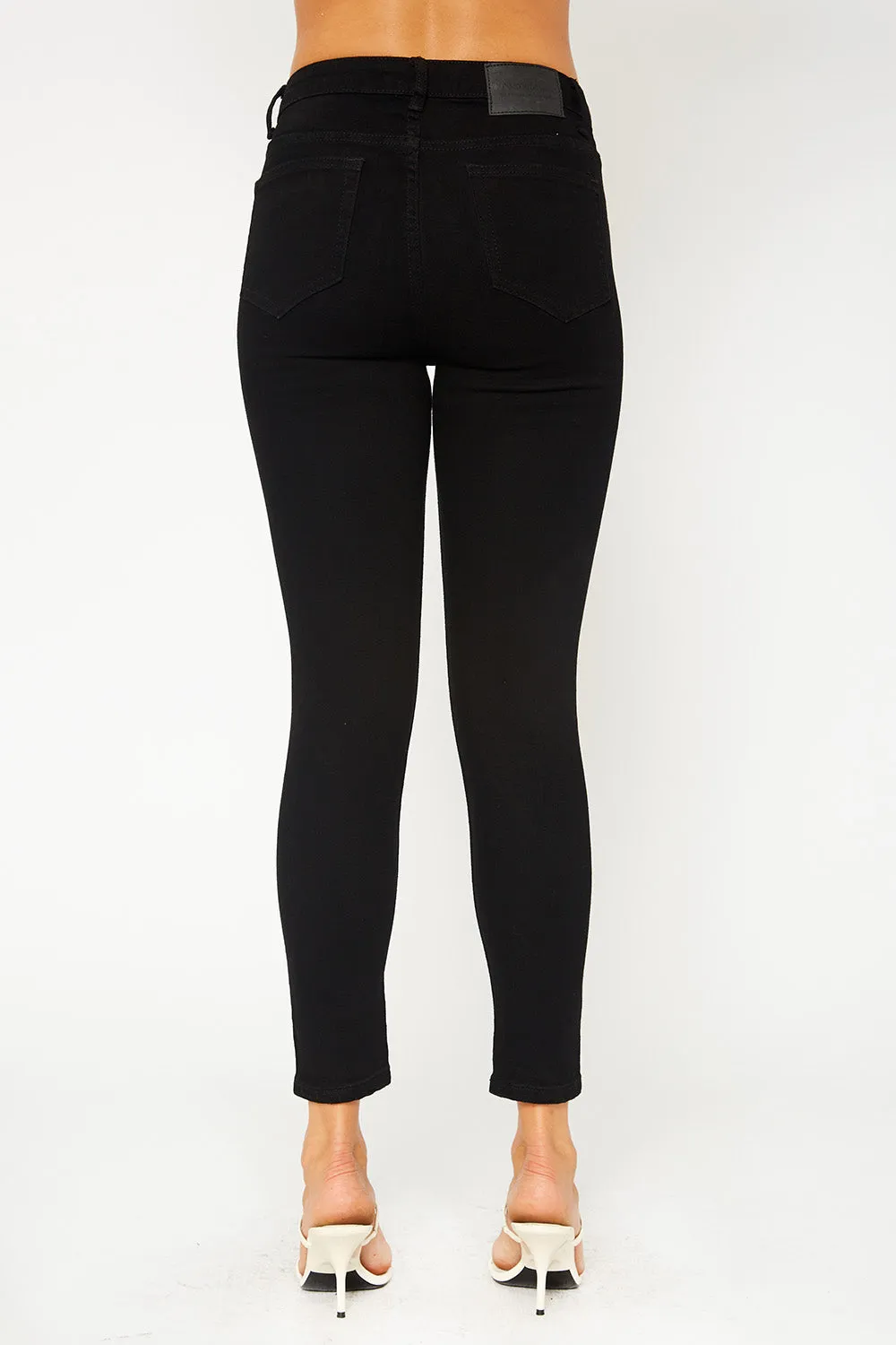 Mid-rise black skinny denim