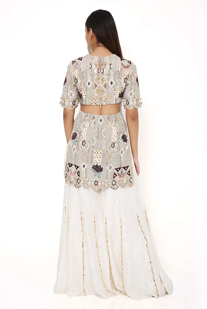 NAVYA OFF WHITE GEORGETTE EMBROIDERED KURTA AND ABLA SILK SHARARA WITH NET MUKAISH DUPATTA