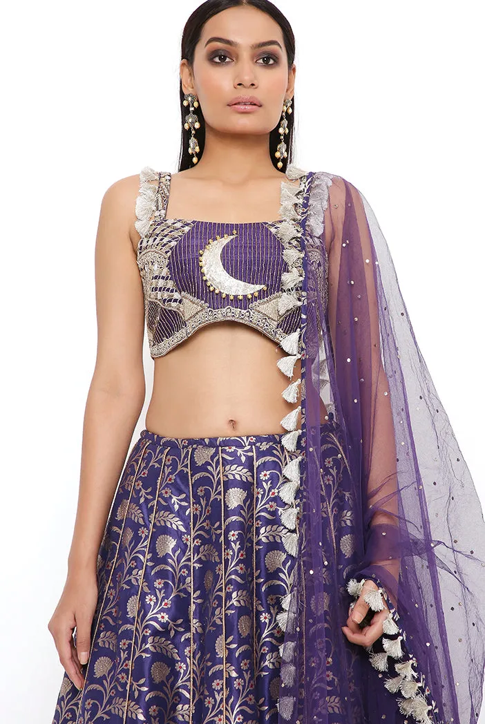 NINA NAVY DUPION SILK BROCADE EMBROIDERED BUSTIER WITH BROCADE LEHENGA AND MUKAISH NET DUPATTA