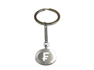 Silver Toned Etched Oval Swiss Franc Currency Sign Pendant Keychain