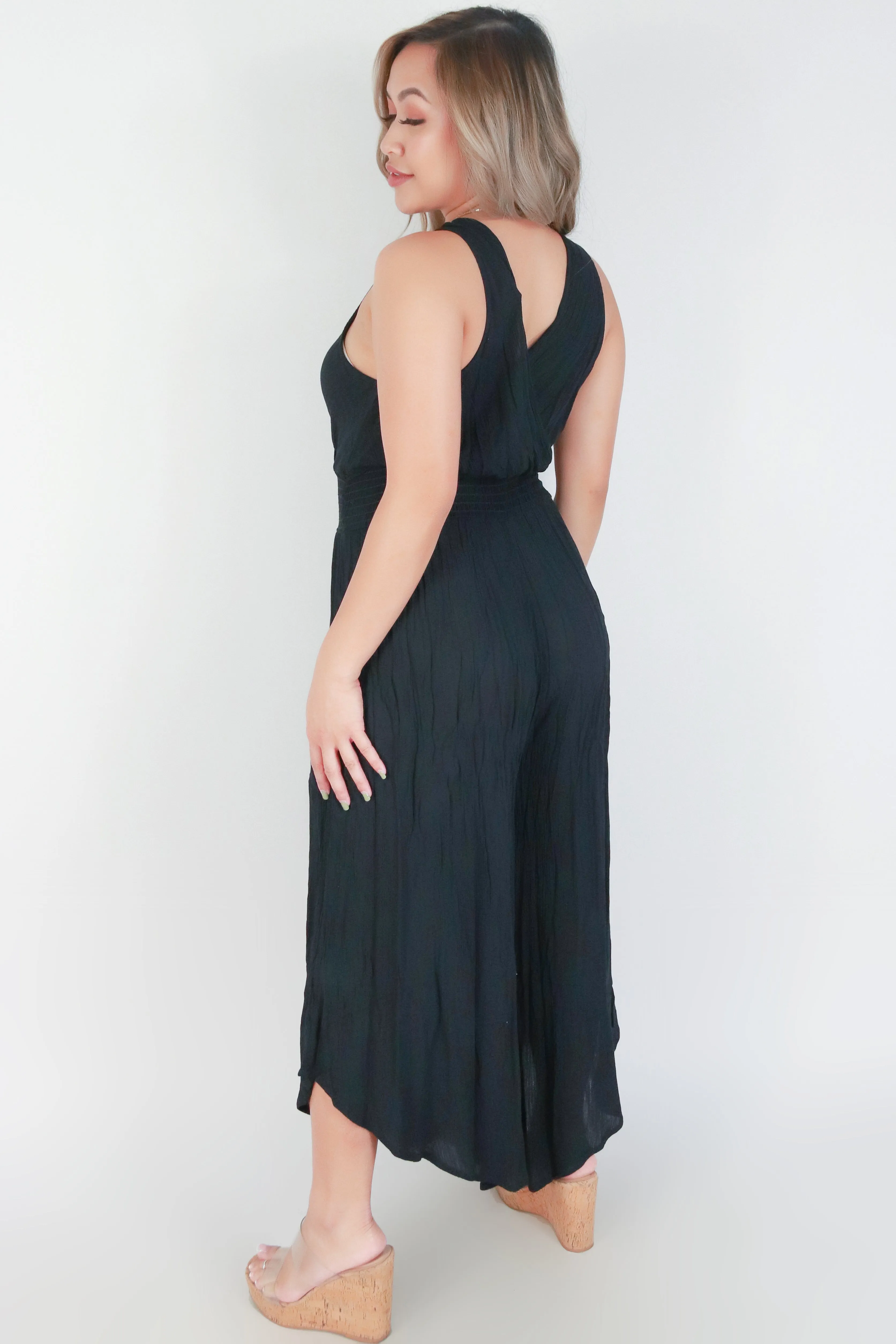 WIDE LEG SMOCKED WAIST JUMPSUIT